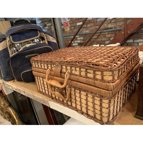 274 - A WOVEN PICNIC HAMPER INCLUDING PLASTIC CUPS, PLATES AND A BLANKET AND A SECOND PICNIC RUCKSACK TO I... 