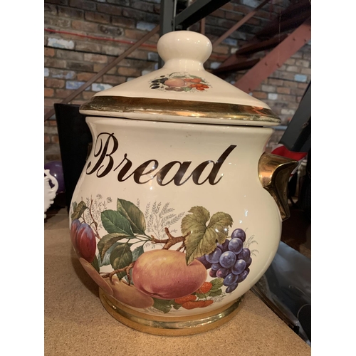 275 - A LARGE LIDDED BREAD POT A/F HAIRLINE CRACK AND A BOWL