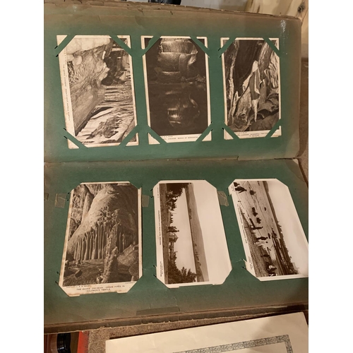 279 - A VINTAGE POSTCARD ALBUM CONTAINING VARIOUS SCENES IN BLACK AND WHITE AND COLOUR