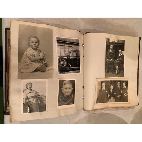 293 - A VINTAGE PHOTO ALBUM OF VARIOUS BLACK AND WHITE PHOTOS