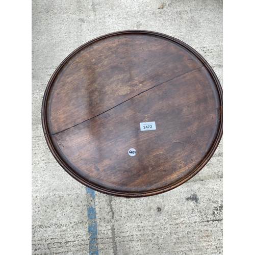 2472 - A VICTORIAN TRIPOD WINE TABLE