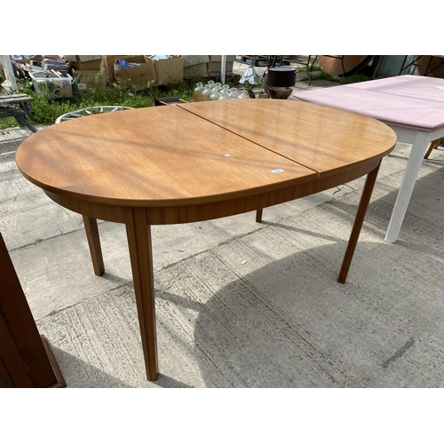 2477 - A MCINTOSH TEAK DINING TABLE