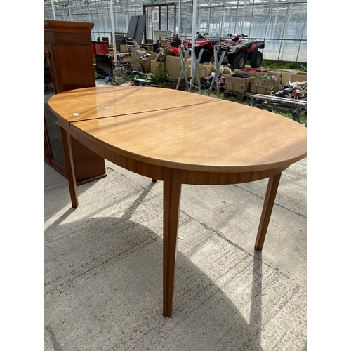 2477 - A MCINTOSH TEAK DINING TABLE