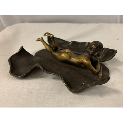 25 - A COLD PAINTED BRONZE OF A LADY IN A BLANKET LENGTH APPROXIMATELY 14CM