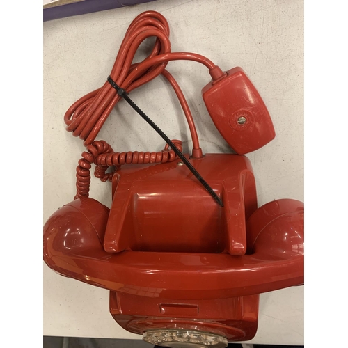 140 - A RETRO RED DIAL UP TELEPHONE IN RED