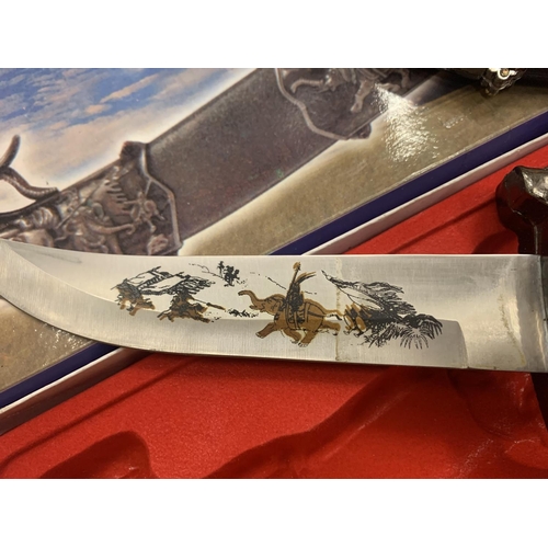 142 - A BOXED ORNATE KNIFE IN AN ELEPHANT DESIGN