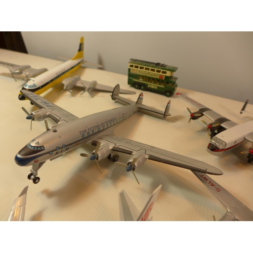 455 - SEVEN PAINTED MODEL PLANES AND A BUS