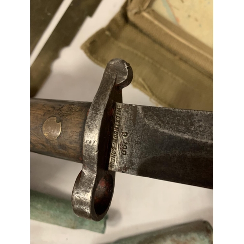 598 - AN 1888 PATTER LEEMETFORD BAYONET WILKINSON SWORD, A 1917 BUTTON POLISHED GUARD AND TWO USA 50 CAL. ... 