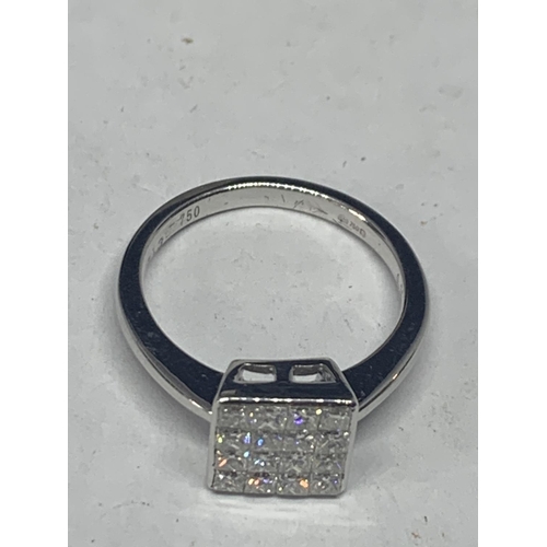 602 - AN 18 CARAT WHITE GOLD RING WITH SIXTEEN DIAMONDS SET IN A SQUARE GROSS WIEGHT 3.9 GRAMS SIZE L/M WI... 