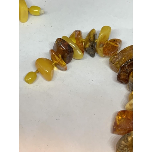 607 - A BUTTERSCOTCH AMBER NECKLACE GROSS WEIGHT 149 GRAMS LENGTH 56CM