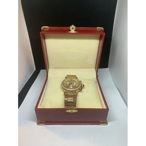 675 - A BOXED FASHION WATCH