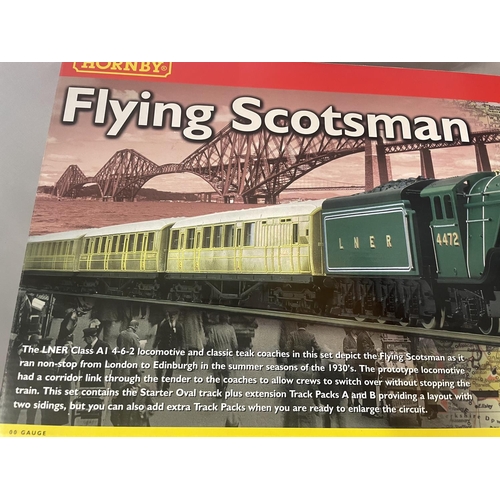 301 - A BOXED HORNBY FLYING SCOTSMAN 00 GAUGE TRAIN SET (R1039) - AS NEW AND UNUSED WITH ITEMS IN THEIR OR... 