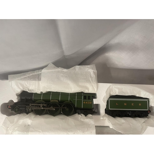 301 - A BOXED HORNBY FLYING SCOTSMAN 00 GAUGE TRAIN SET (R1039) - AS NEW AND UNUSED WITH ITEMS IN THEIR OR... 