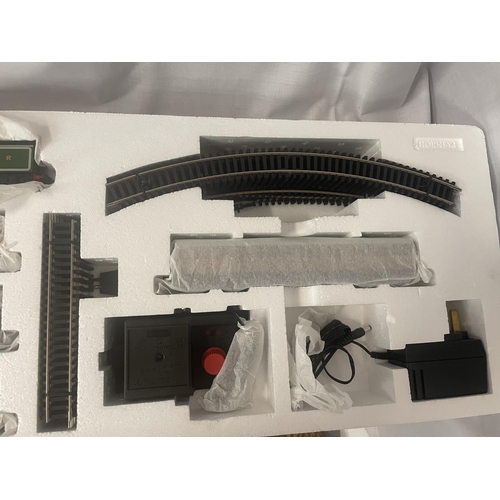 301 - A BOXED HORNBY FLYING SCOTSMAN 00 GAUGE TRAIN SET (R1039) - AS NEW AND UNUSED WITH ITEMS IN THEIR OR... 