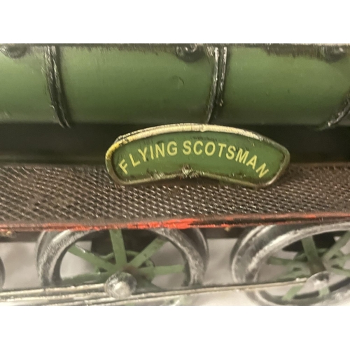 303 - A TIN PLATE MODEL OF THE FLYING SCOTSMAN LOCOMOTIVE AND TENDER