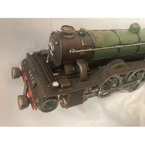 303 - A TIN PLATE MODEL OF THE FLYING SCOTSMAN LOCOMOTIVE AND TENDER