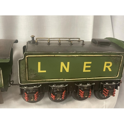 303 - A TIN PLATE MODEL OF THE FLYING SCOTSMAN LOCOMOTIVE AND TENDER