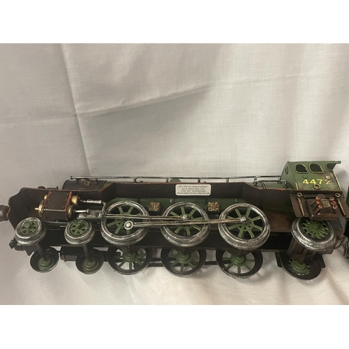 303 - A TIN PLATE MODEL OF THE FLYING SCOTSMAN LOCOMOTIVE AND TENDER