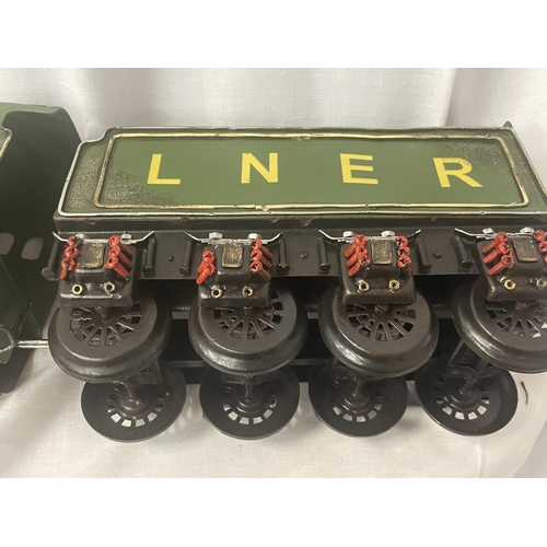 303 - A TIN PLATE MODEL OF THE FLYING SCOTSMAN LOCOMOTIVE AND TENDER