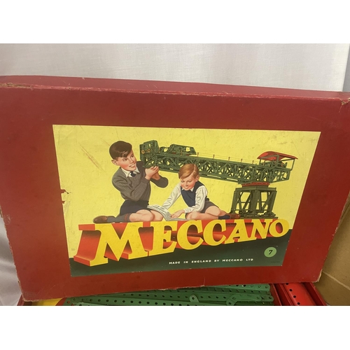 309 - A BOXED VINTAGE MECANNO SET AND A BOX CONTAINING NUMEROUS MECANNO PARTS