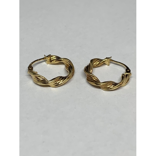 551 - A PAIR OF 9 CARAT GOLD TWIST EARRINGS WITH A PRESENTATION BOX