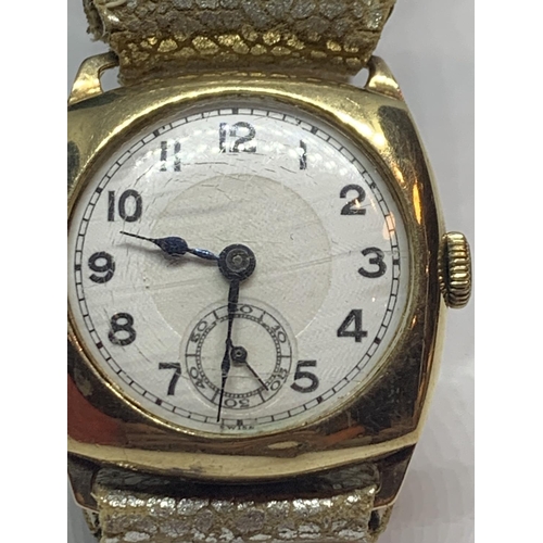 555 - A VINTAGE 9 CARAT GOLD WRIST WATCH WITH ENGRAVING DATED 1939