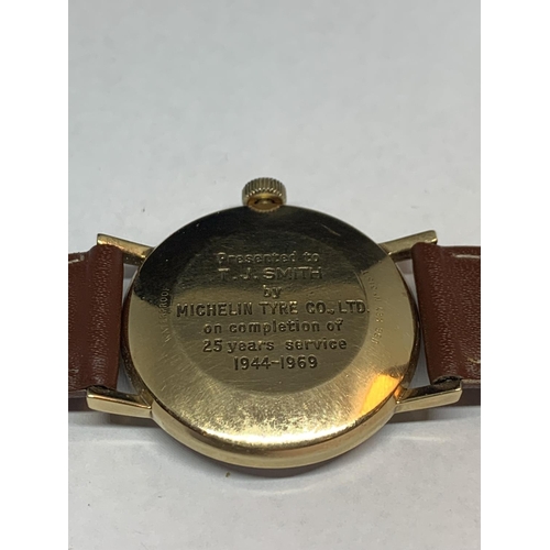 556 - A 9 CARAT GOLD TISSOT SEASTAR SEVEN WRIST WATCH (ENGRAVED ON BACK TO 1969) WITH PRESENTATION CASE