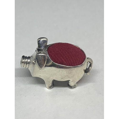 542 - A SILVER PIN CUSHION IN THE GUISE OF A PIG