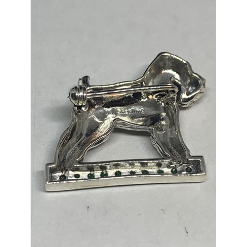 594 - A MARKED SILVER BROOCH WITH GREEN STONES IN THE GUISE OF A SCHNAUZER DOG