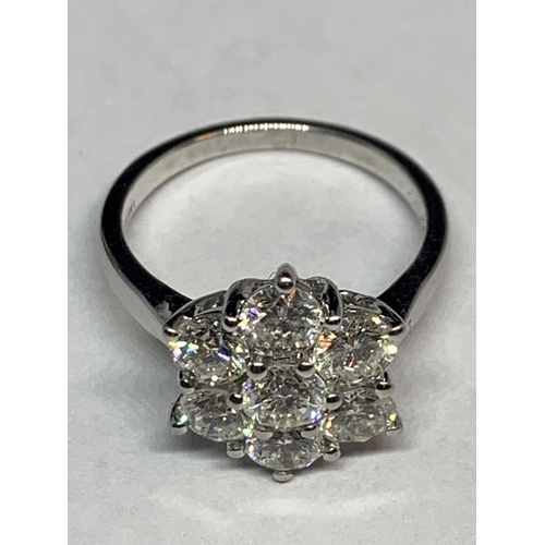 534 - AN 18 CARAT WHITE GOLD FLOWER DESIGN CLUSTER RING WITH 2 CARATS OF DIAMONDS IN A PRESENTATION BOX SI... 