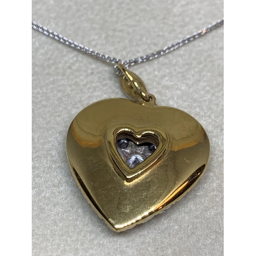 536 - A 15 CARAT WHITE AND YELLOW GOLD LARGE DIAMOND ENCRUSTED HEART CLUSTER PENDANT WITH CHAIN LENGTH 44C... 