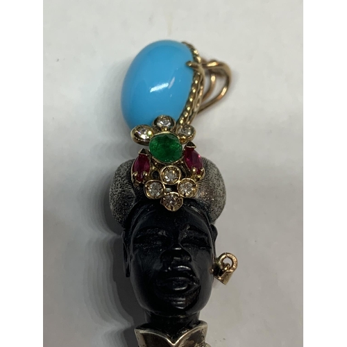 538 - A BLACKAMORE PENDANT OF AN AFRICAN TRIBAL FIGURE WITH RUBYS, EMERALDS AND TURQUOISE STONES BY LUIGI ... 