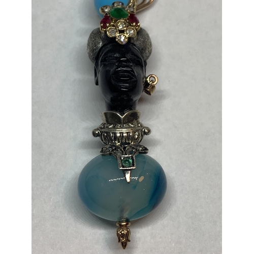 538 - A BLACKAMORE PENDANT OF AN AFRICAN TRIBAL FIGURE WITH RUBYS, EMERALDS AND TURQUOISE STONES BY LUIGI ... 