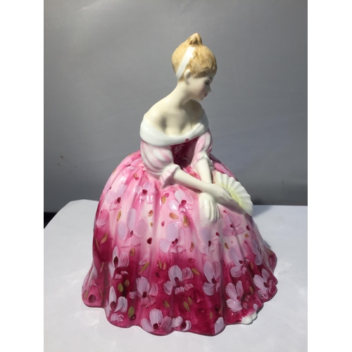 710 - A ROYAL DOULTON FIGURINE 'VICTORIA'