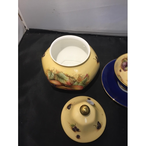 735 - TWO GILDED AYNSLEY FRUIT DECORATED ITEMS TO INCLUDE A CUP AND SAUCER AND A LIDDED JAR