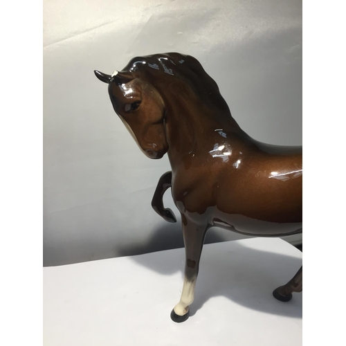 739 - TWO BESWICK BAY HORSES TO INCLUDE A  PRANCING SHIRE AND A THOROUGHBRED (EAR A/F)