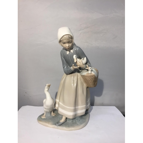 762 - TWO LLADRO FIGURINES TO INCLUDE A GIRL WITH PUPPY AND KITTEN AND A GIRL WITH DUCKLINGS IN A BASKET