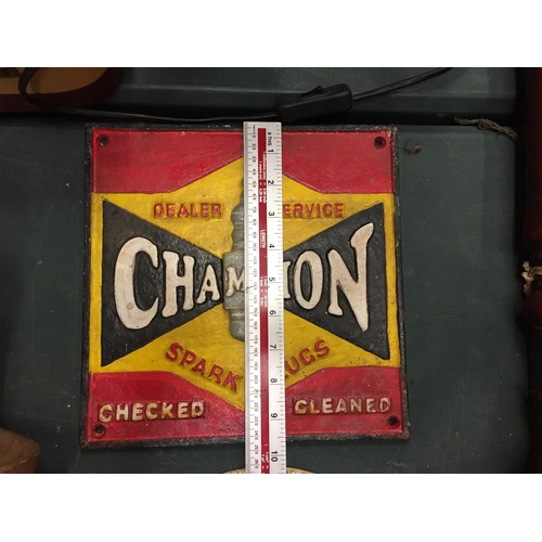 140 - A CAST METAL 'CHAMPION SIGN 25CM X 25CM