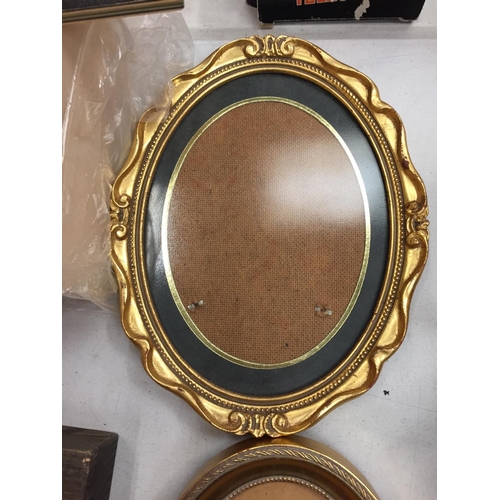 151 - THREE OVAL PICTURE FRAMES