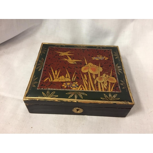 210 - TWO JEWELLERY BOXES WITH ORIENTAL DESIGN