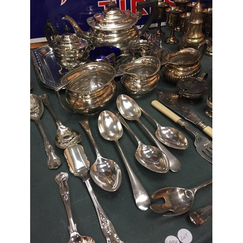 225 - A LARGE QUANTITY OF SILVER PLATED ITEMS TO INCLUDE TEASET, JUGS, VASES, FLATWARE ETC