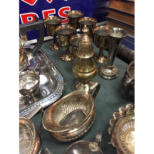 225 - A LARGE QUANTITY OF SILVER PLATED ITEMS TO INCLUDE TEASET, JUGS, VASES, FLATWARE ETC