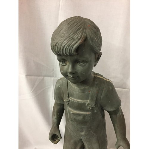 261 - A RESIN MODEL OF A YUNG BOY IN DUNGAREES (HAND A/F)