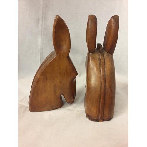 272 - A PAIR OF TREN CARVED BOOKENDS