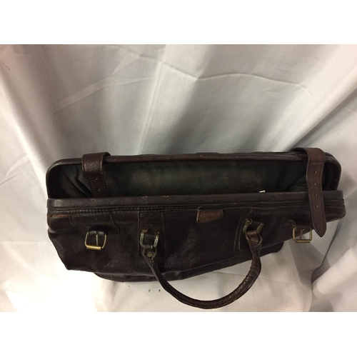 277 - A LARGE LEATHER GENTS HOLDALL