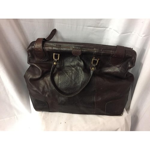 277 - A LARGE LEATHER GENTS HOLDALL