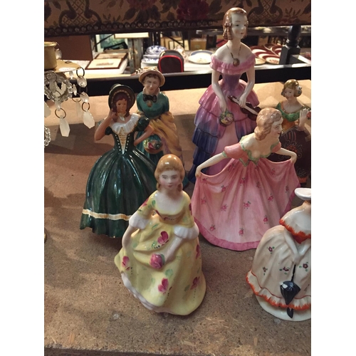 295 - A COLLECTION OF CERAMIC FIGURINES