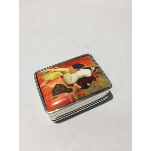 607 - A MARKED 925 SILVER PILL BOX WITH AN ENAMEL  EROTIC DESIGN TOP