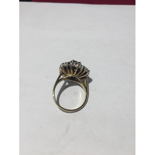 615 - A 9CT GOLD RING WITH THIRTY SAPHIRES AND SEVEN DIAMONDS. SIZE N/O - 5.7GMS