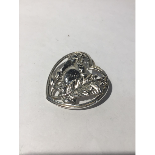 616 - A MARKED DENMARK SILVER HEART SHAPED BROOCH WITH BIRD AND LEAF DESIGN